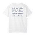 Back of the white Bareboat Motto Tee: Lose the phone. Grab a ball. Kill the engines. Pour some rum. Stay gone.